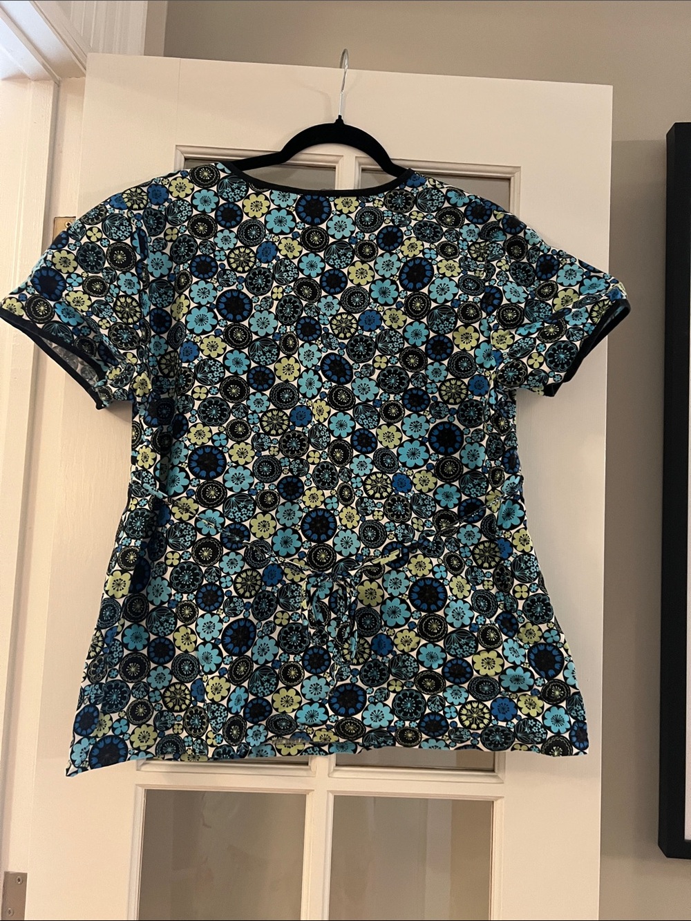 Cherokee Women’s Blue &Black Floral Wrap-Front Scrub Top - Picture 2 of 6